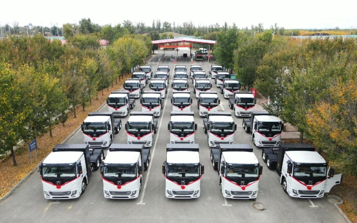 脱碳“换”绿举行时！pp电子新能源重卡批量交付西北